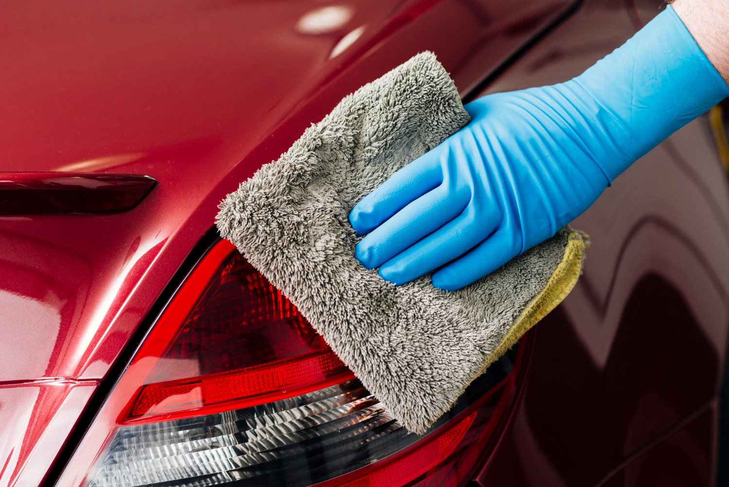 close-up-person-cleaning-car-exterior close-up-person-cleaning-car-exterior